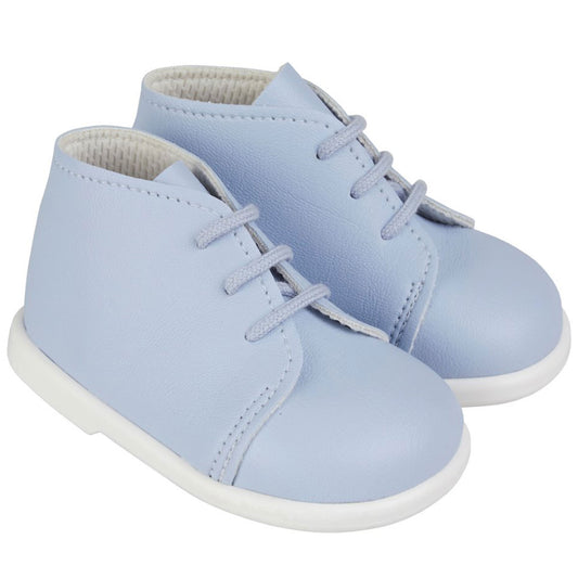 Pair of light blue baby shoes with white soles on a white background