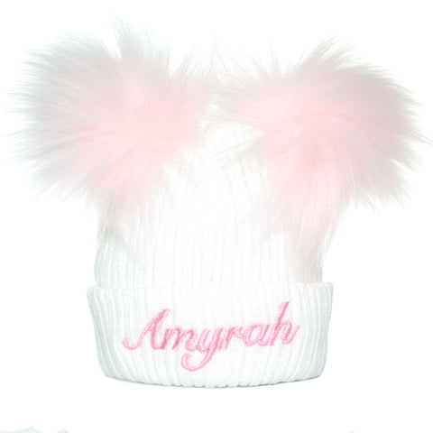 personalised baby girl pom hat in white with pink bobbles