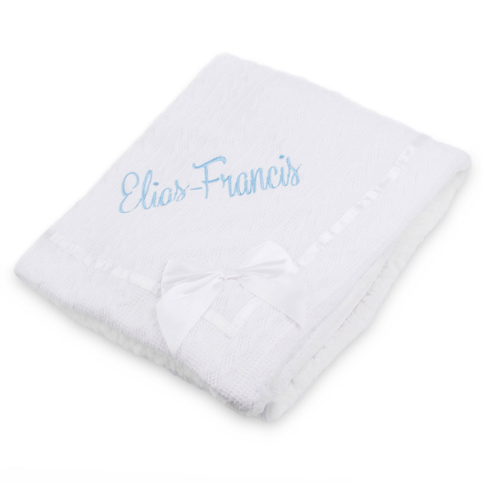 White baby blanket with embroidered name 'Elias-Francis' on a white background