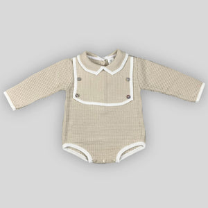 beige knitted baby romper