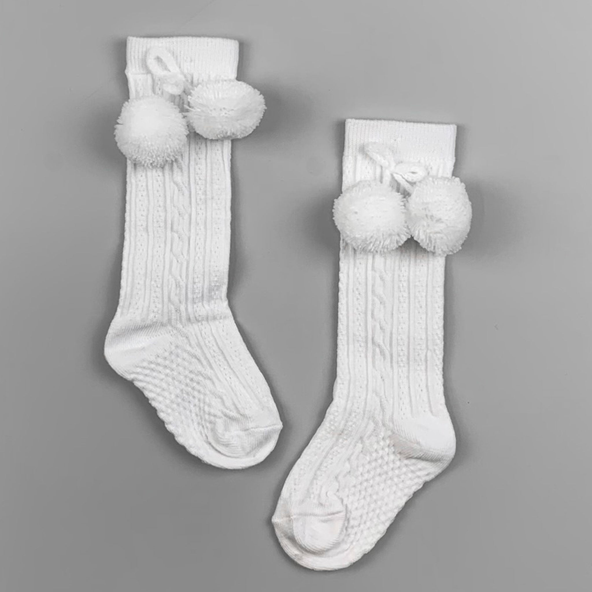 white unisex pom pom baby socks