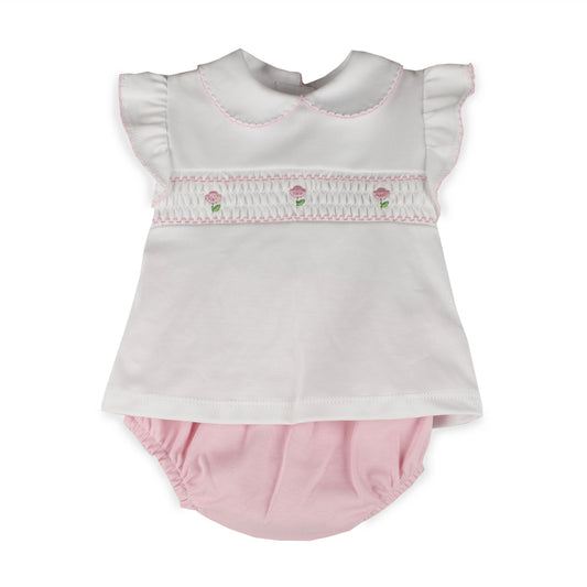Baby girls white smocked top with pink flower embroidery and matching pink jam pants made from 100% cotton in Portugal.