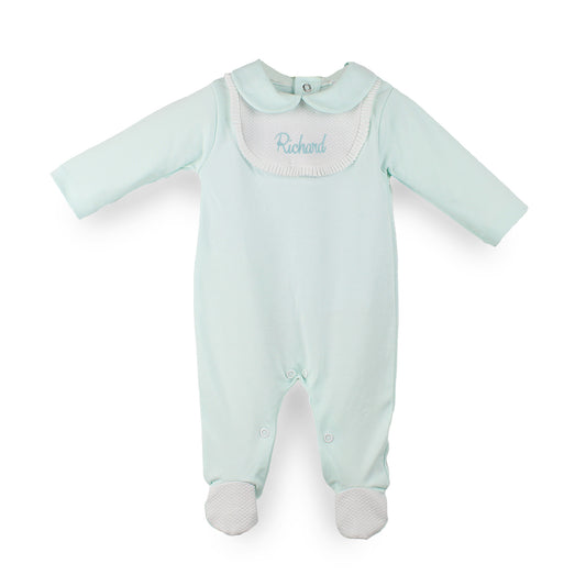 Personalised mint green baby sleepsuit with white bib and Peter Pan collar, embroidered with the name Richard.