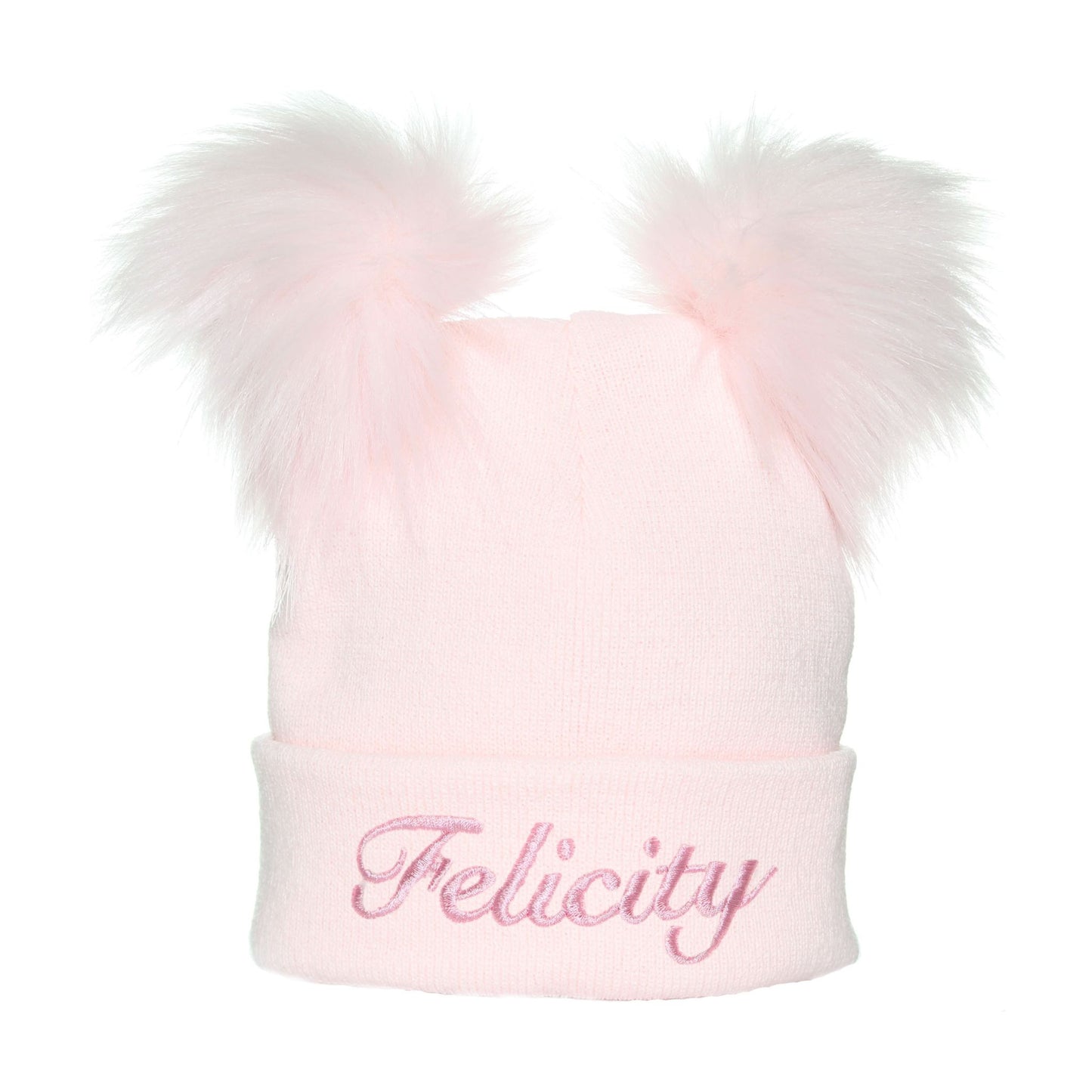 Pink beanie with two large pom-poms and 'Felicity' embroidery on a white background
