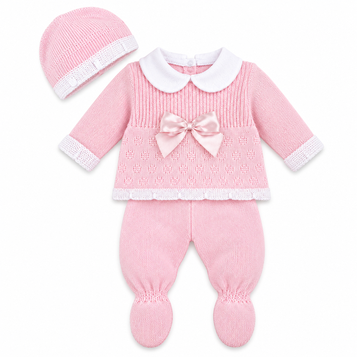 A pink baby knit outfit set including a long-sleeve top with a white Peter Pan collar, a matching pink footed bonnet, and a large pink satin bow at the center chest, displayed on a clean white background.