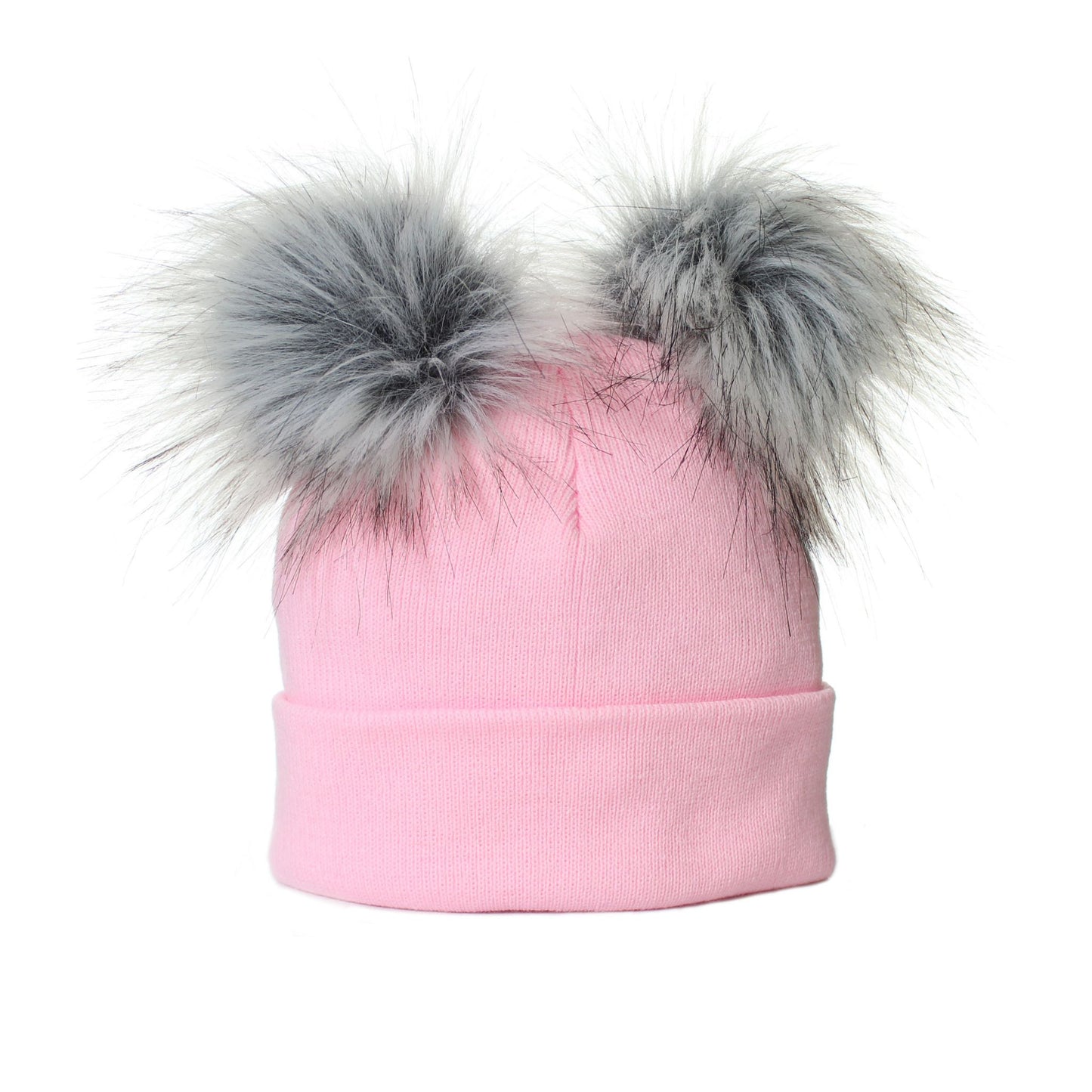 Pink beanie with two large gray fur pom-poms on a white background