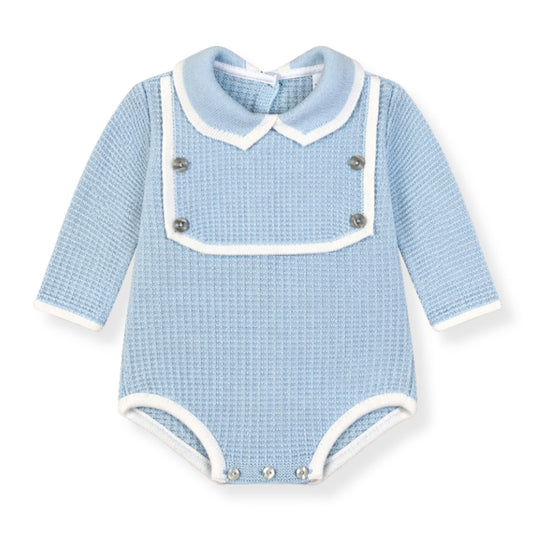 Blue baby romper with white collar and buttons on a white background