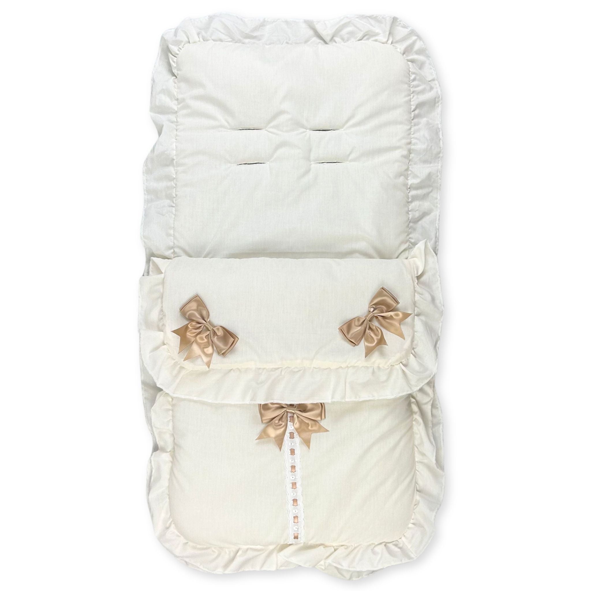 cream footmuff with three beige bows