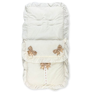 cream footmuff with three beige bows