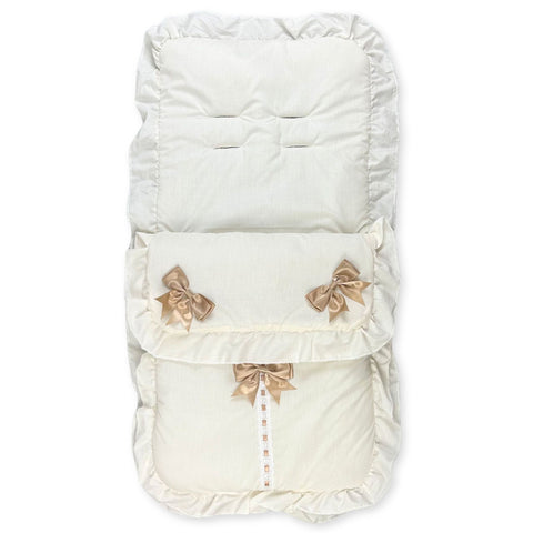 cream footmuff with three beige bows