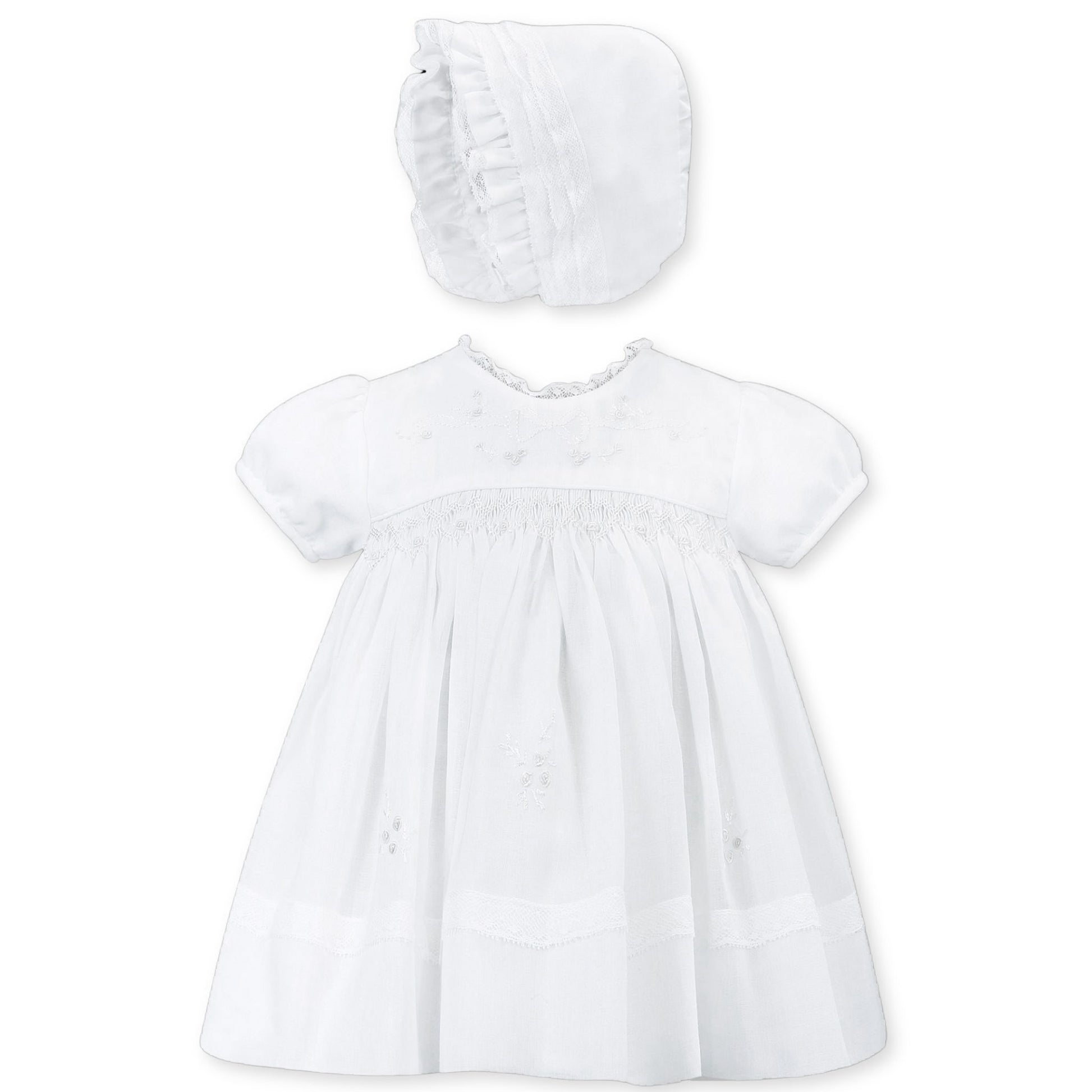 baby girls christening dress with smocking and bonnet in white