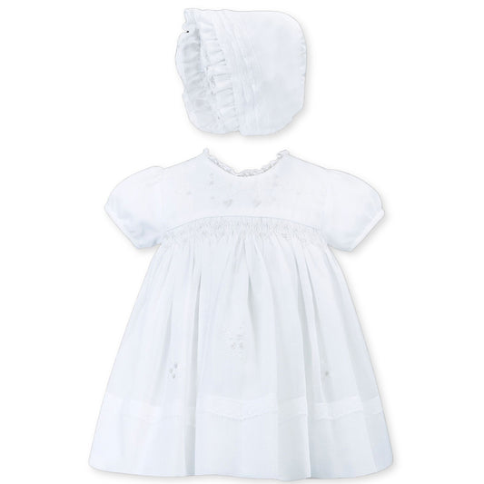 baby girls christening dress with smocking and bonnet in white