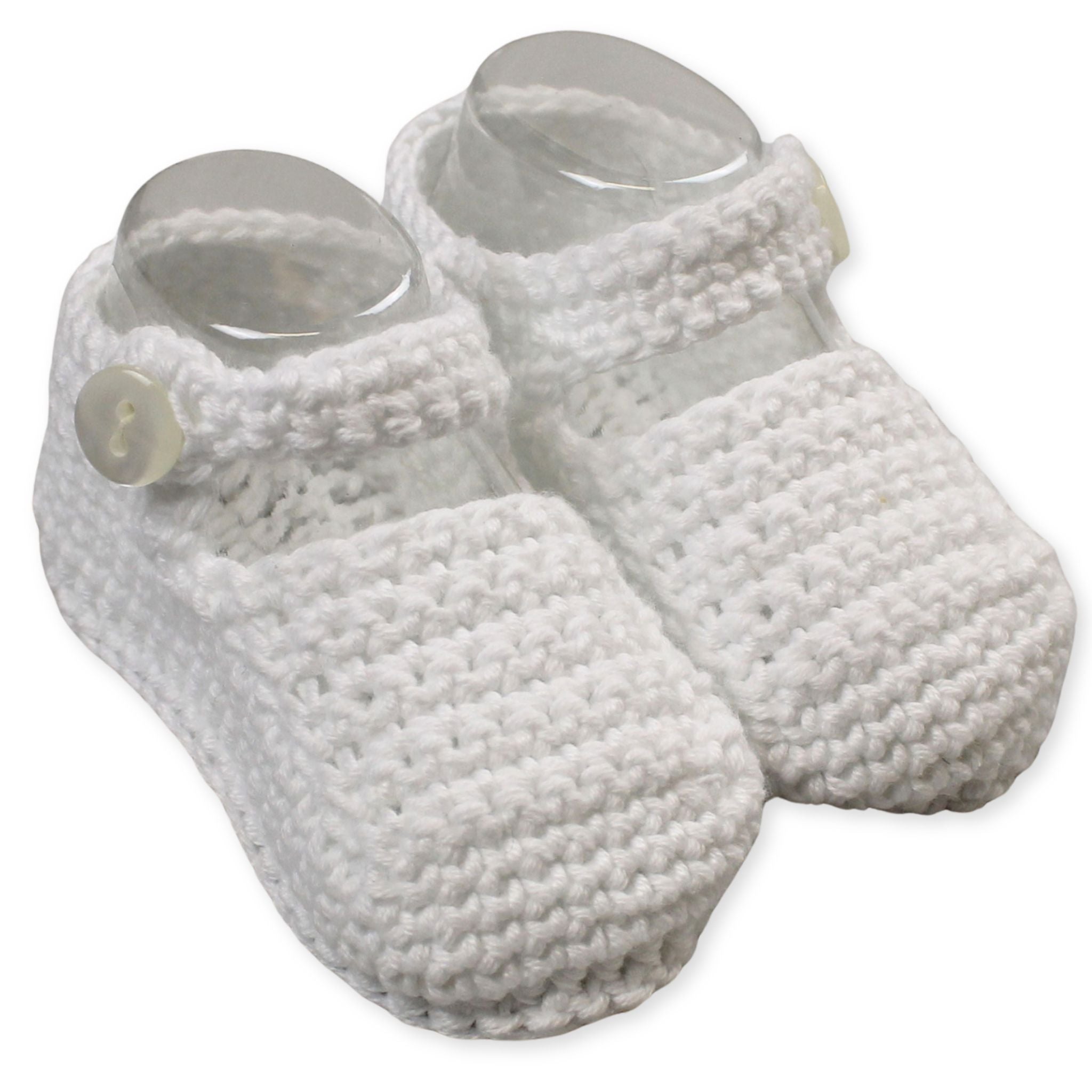 white knitted baby shoes