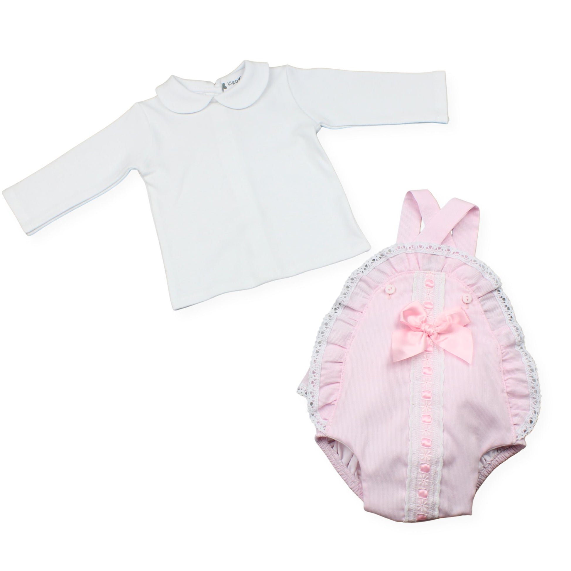 White long-sleeve shirt and pink baby romper with ruffles and a bow on a white background