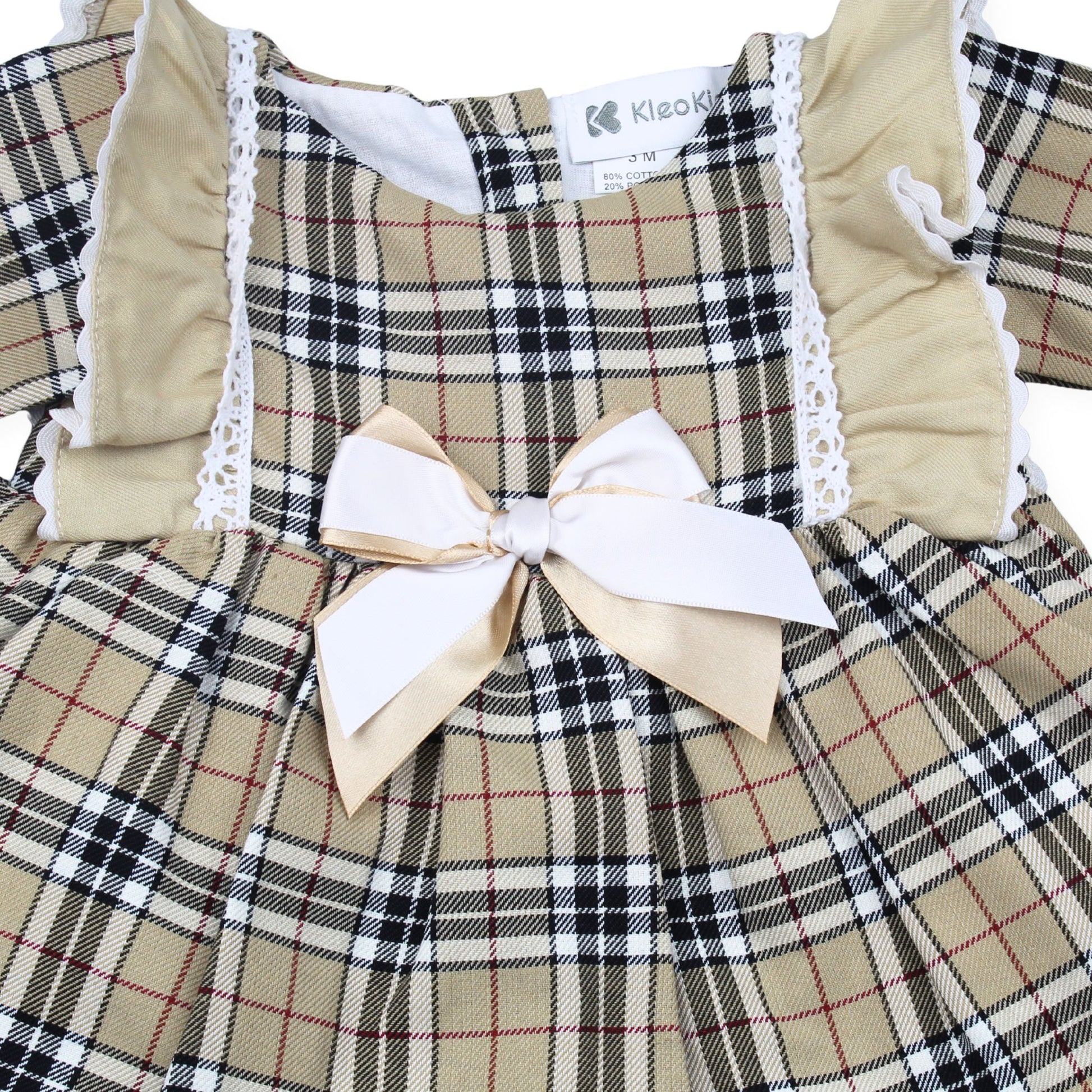 Plaid dress with a bow and lace details, brand 'Kleokids' visible