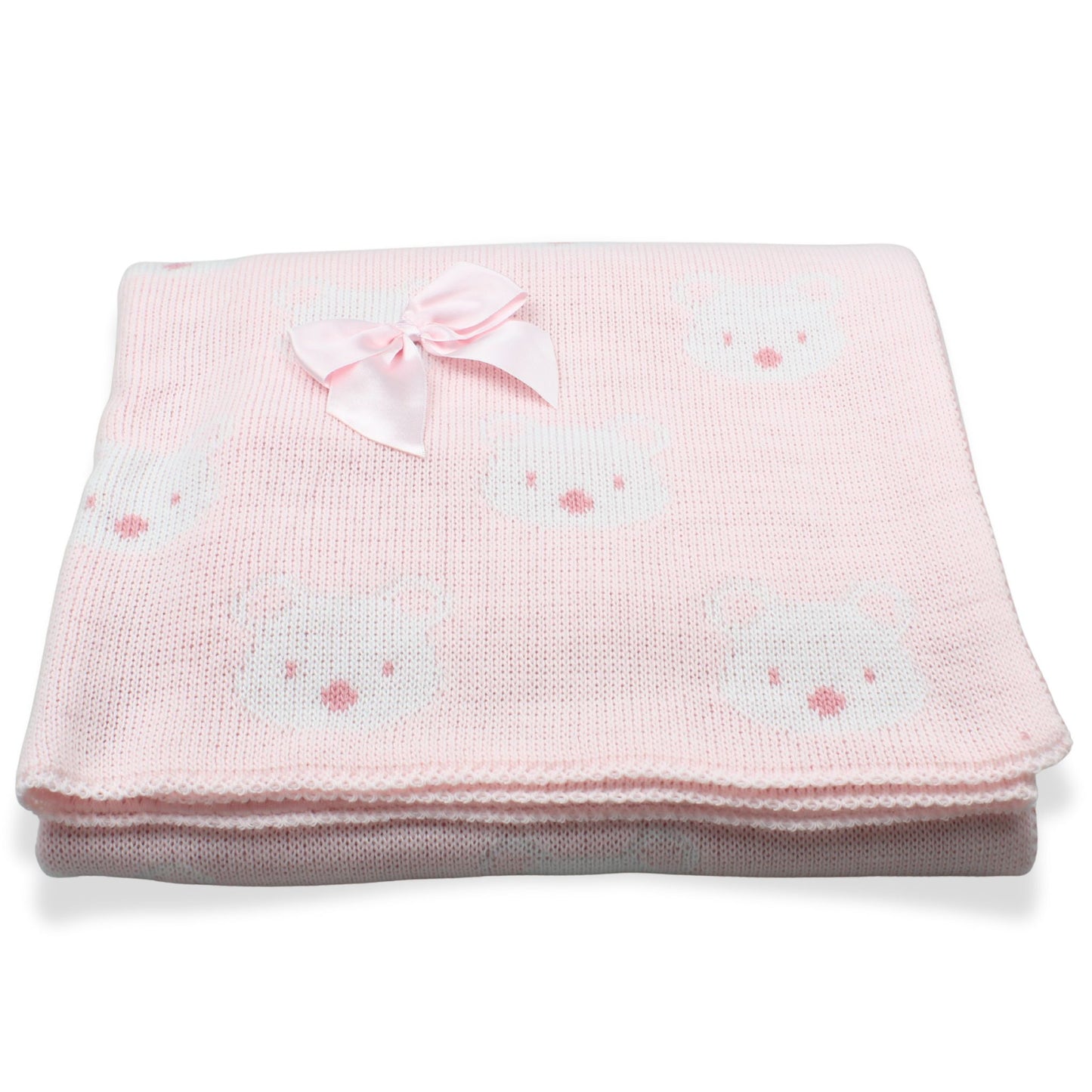 Pink baby blanket with bow and bear patterns on a white background