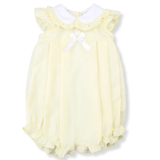 Yellow baby romper with ruffled details on a white background