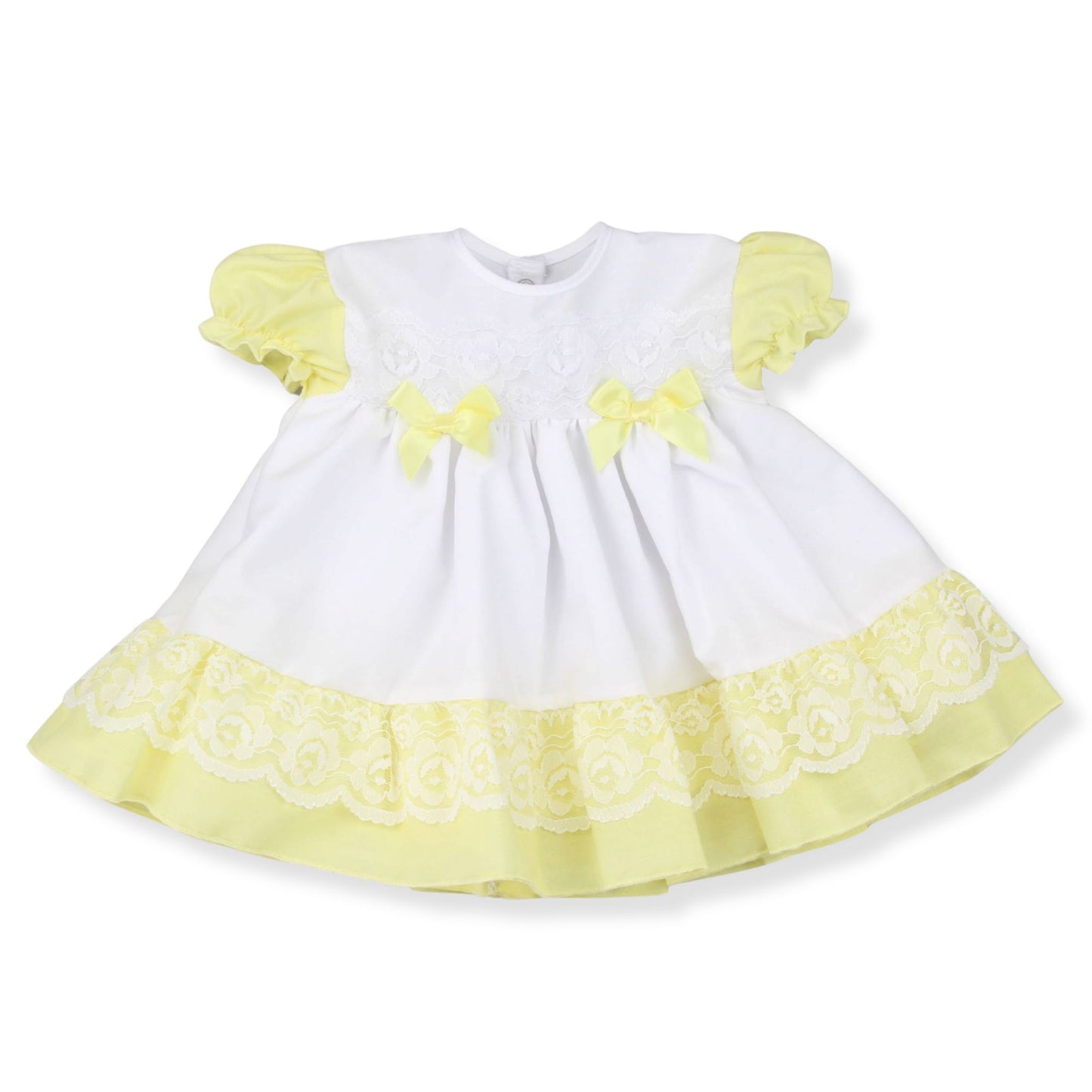 White dress with yellow accents on a white background