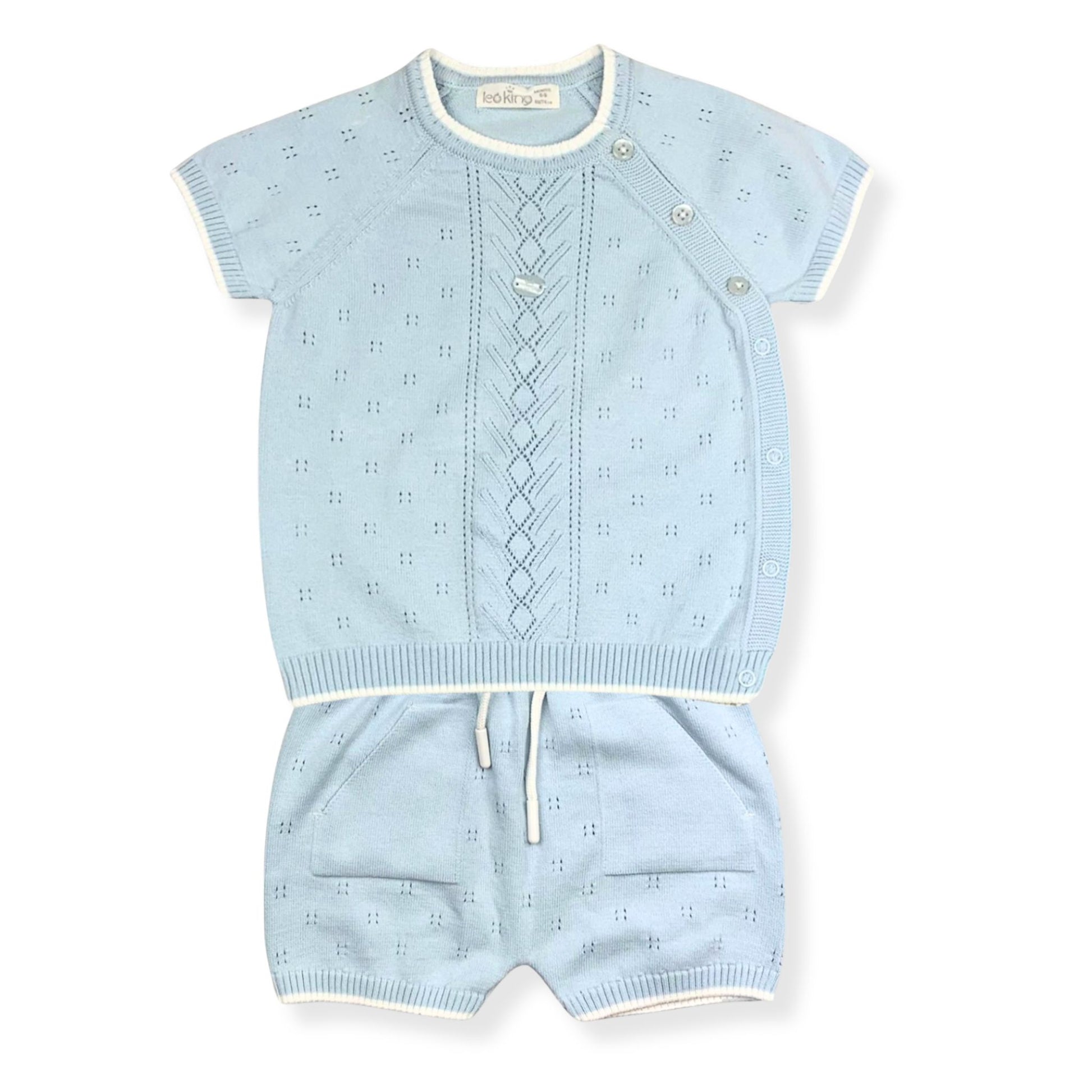 Light blue baby outfit with short-sleeve top and shorts on a white background