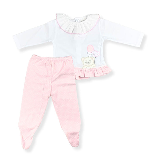 Baby outfit with white top and pink pants on a white background