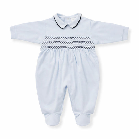 Light blue baby babygrow with navy smocking on a white background