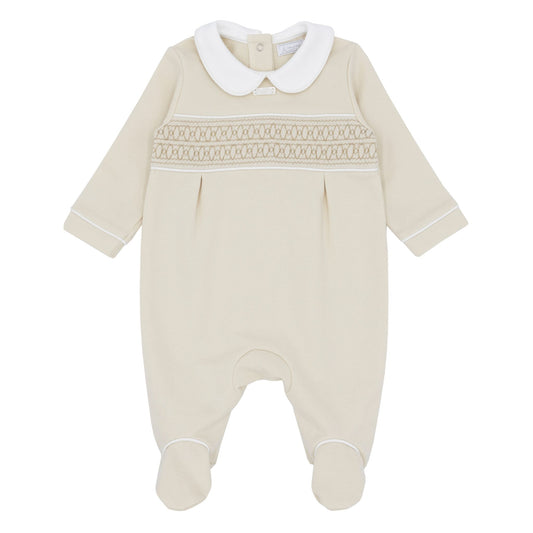 Beige baby romper with white collar on a white background
