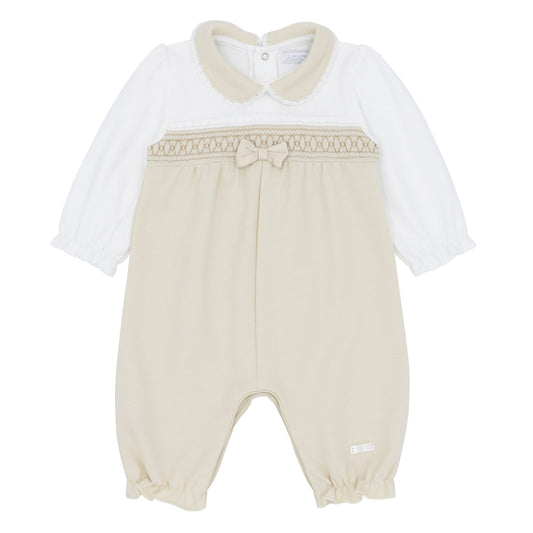 Baby outfit with white long-sleeve top and beige pants on a white background