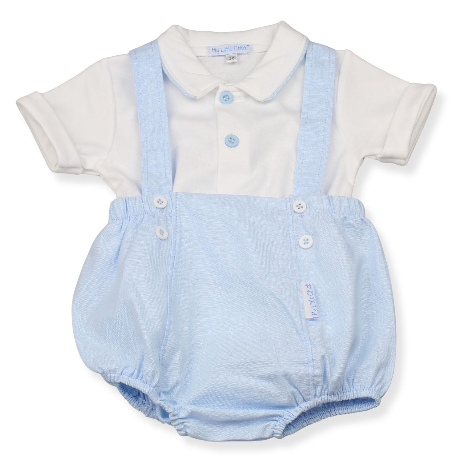 Baby romper with blue overalls and white shirt on a white background