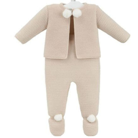 Beige baby outfit with jacket and pants on a white background