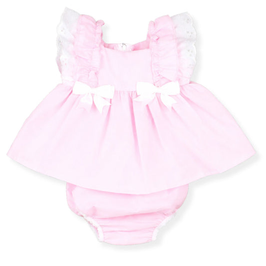 Pink baby romper with ruffled sleeves on a white background