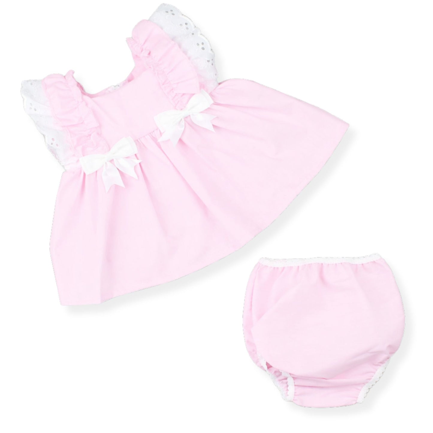 Pink baby dress with white trim and matching bloomers on a white background