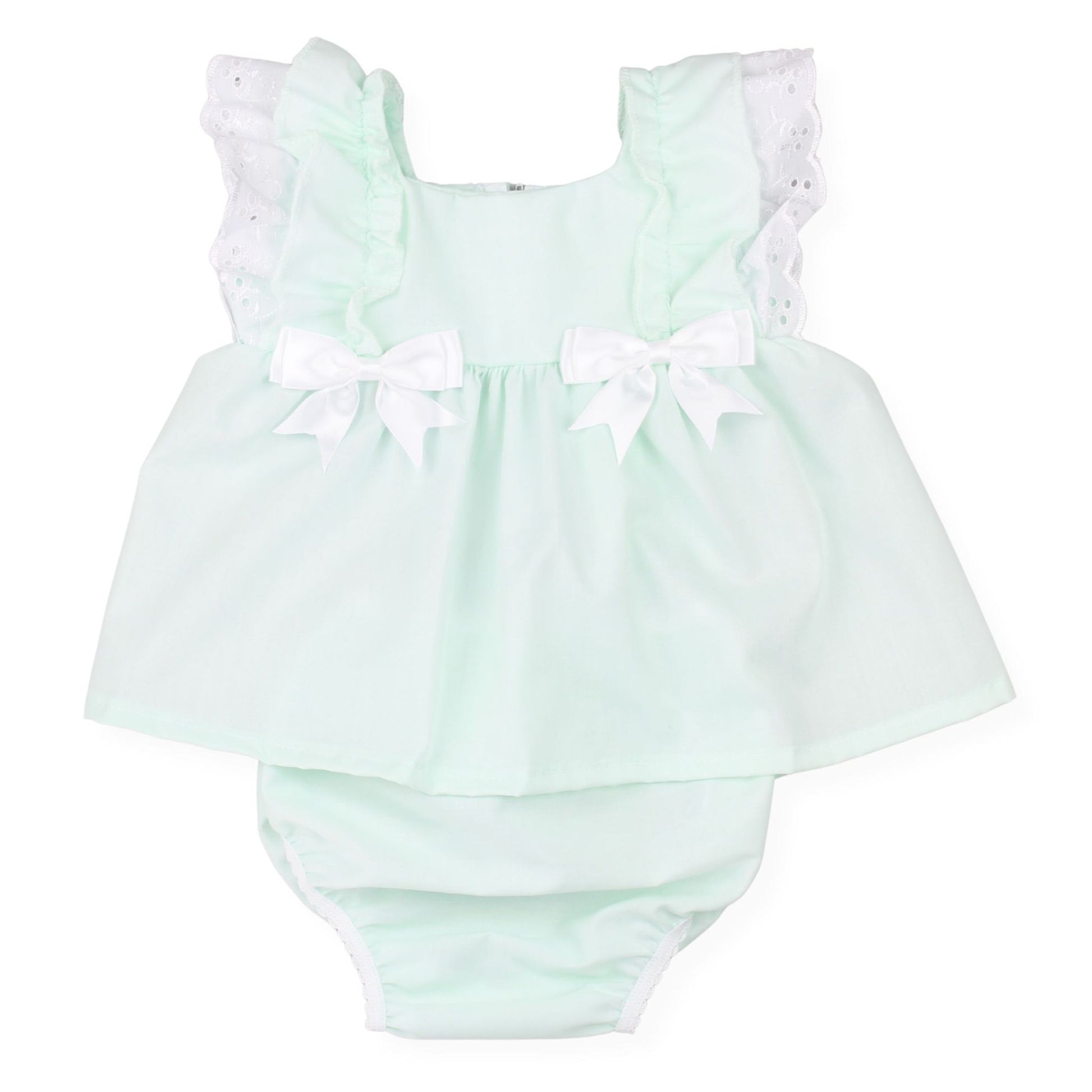 Mint green baby romper with white ruffled sleeves and bows on a white background