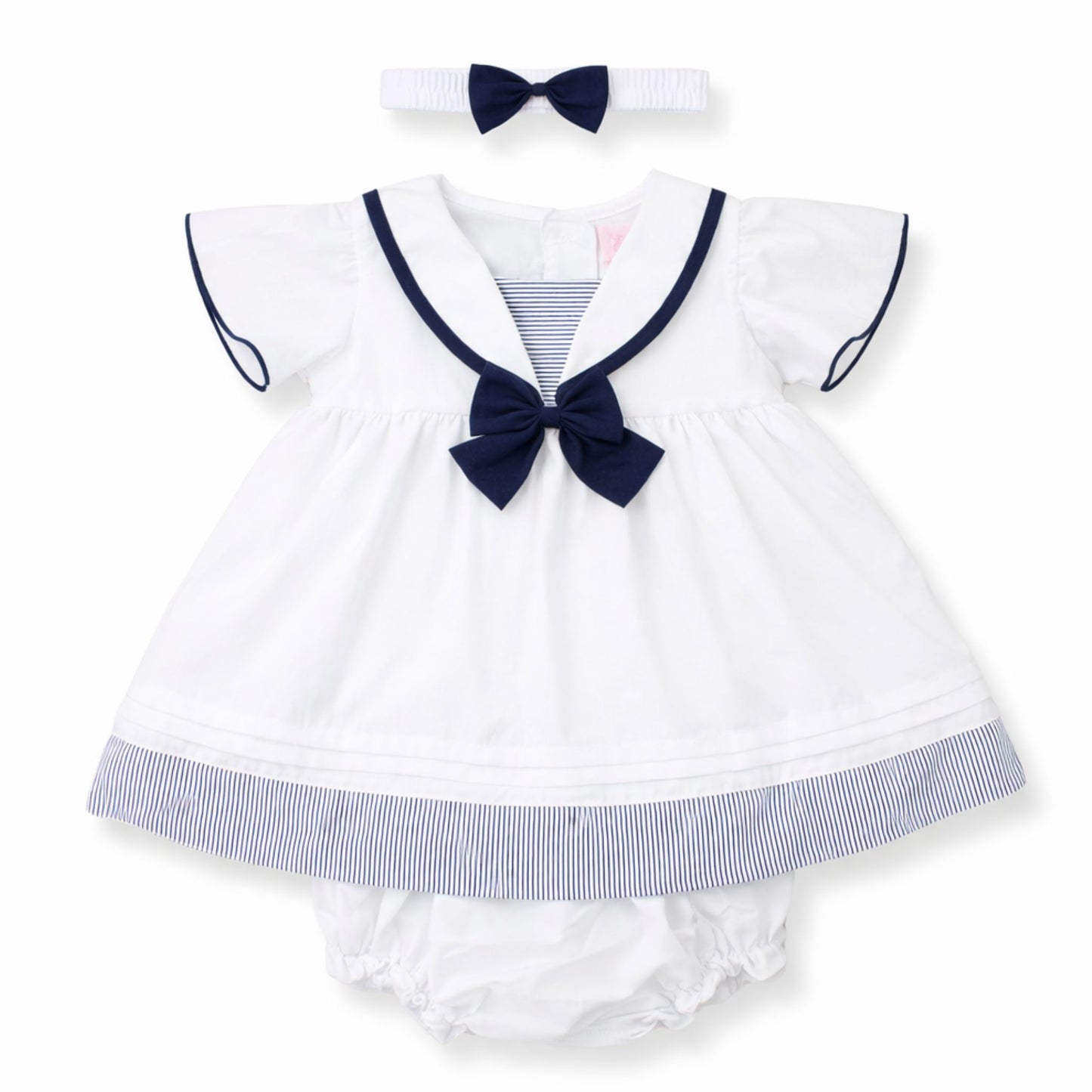 Baby sailor outfit with dress, bloomers, and headband on a white background