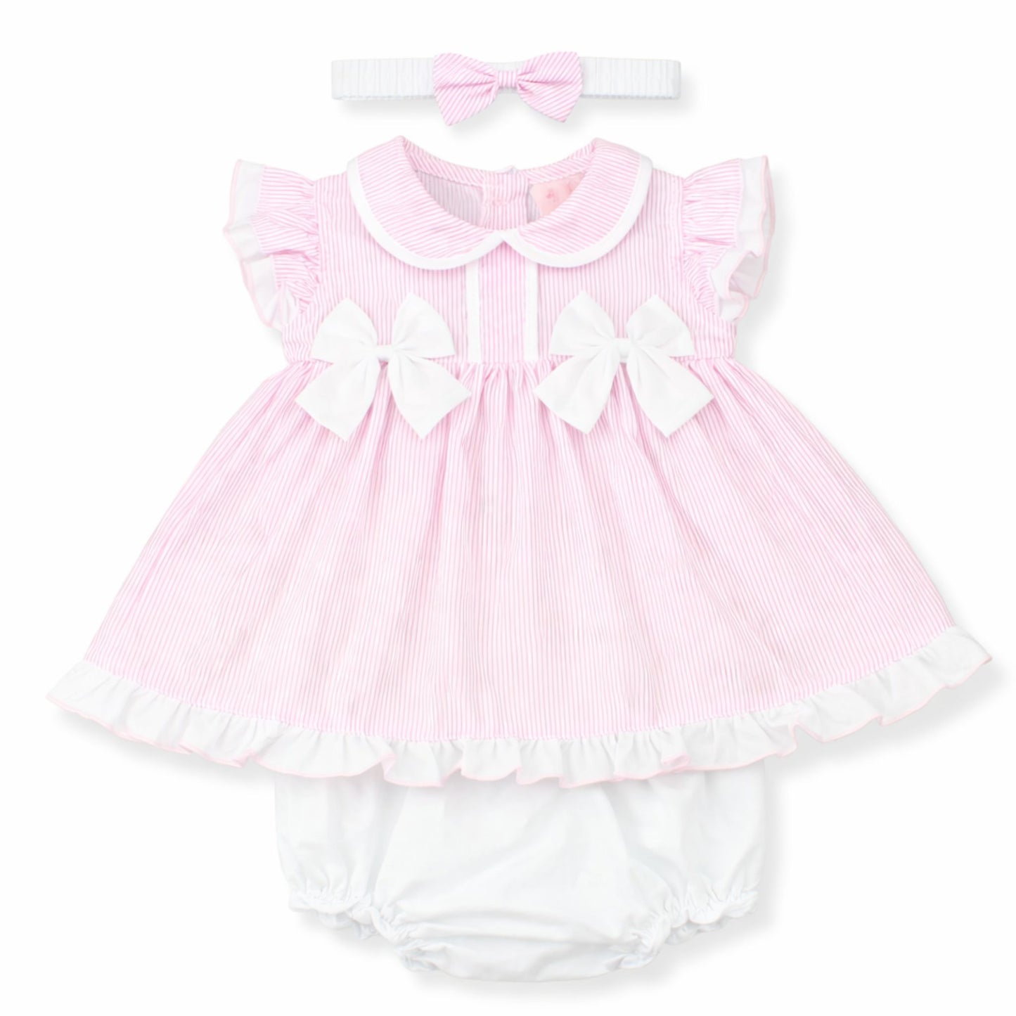 Pink baby dress with white ruffles and matching headband on a white background