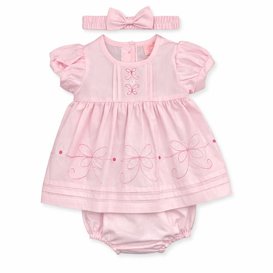 Pink baby dress with ruffles, embroidered details, and matching headband on a white background