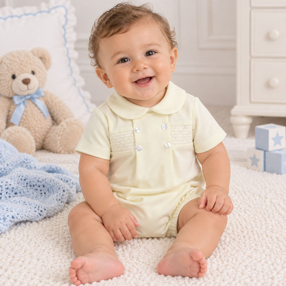 unisex lemon romper with buttons and smocking