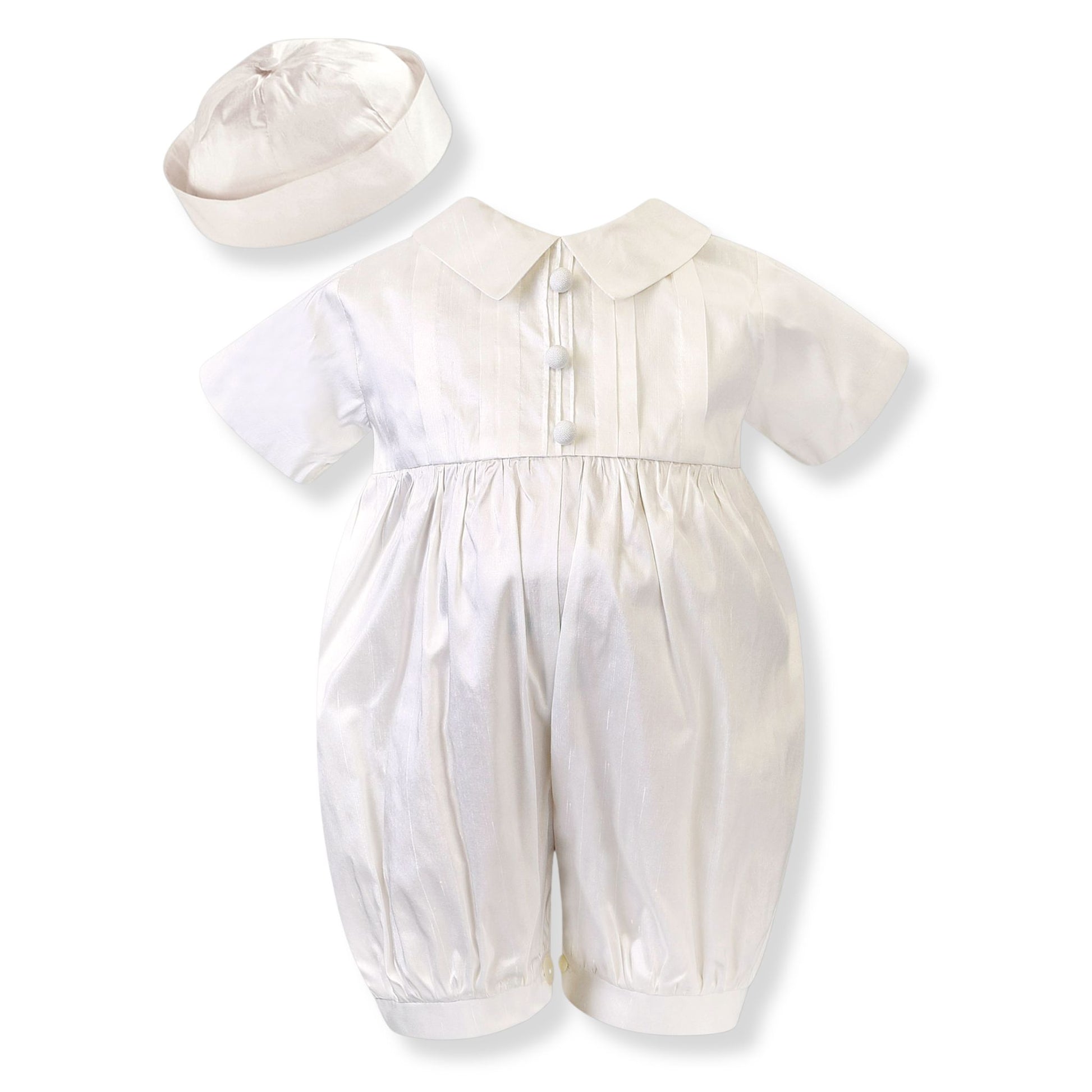 White baby romper with matching hat on a white background