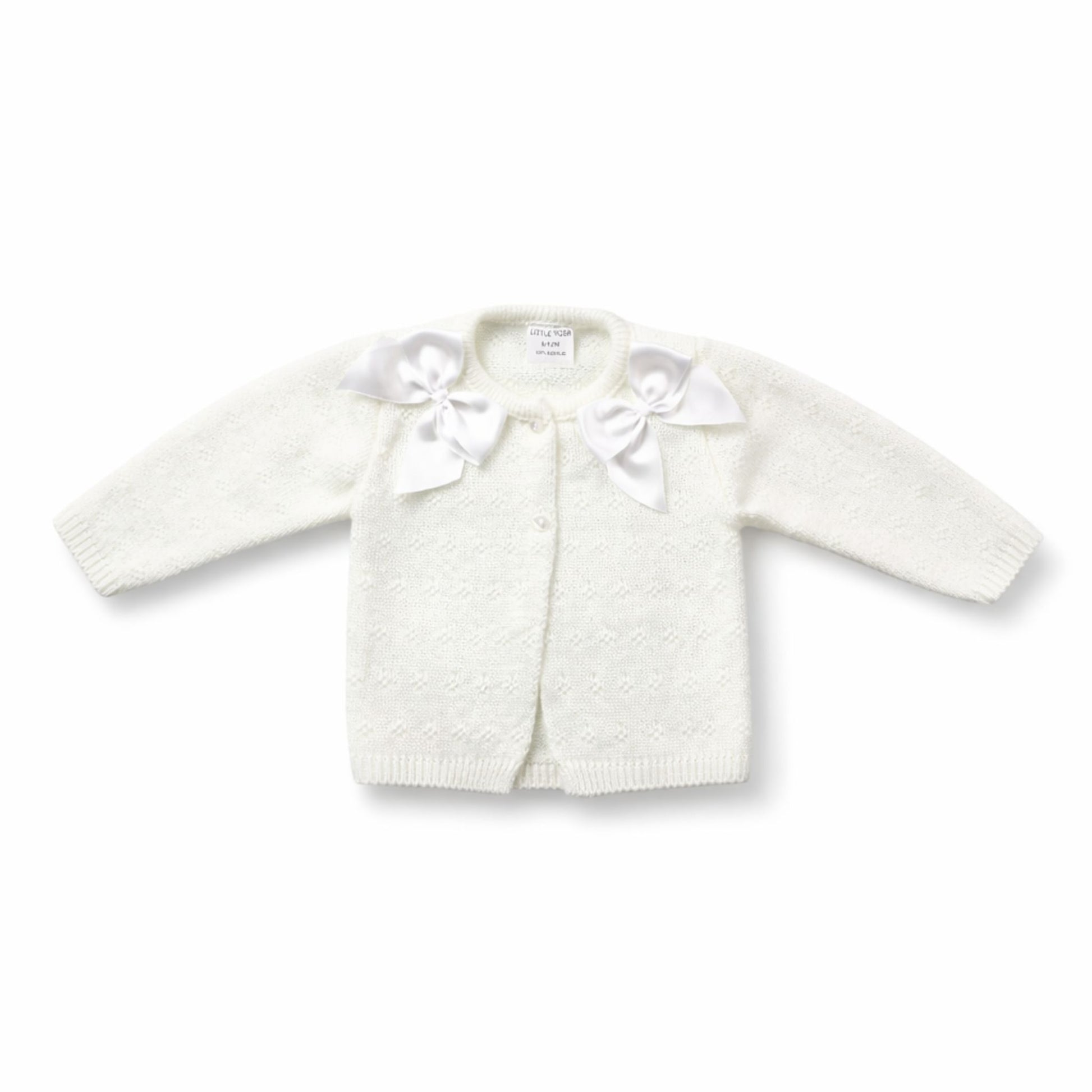 White knitted cardigan with bow details on a white background