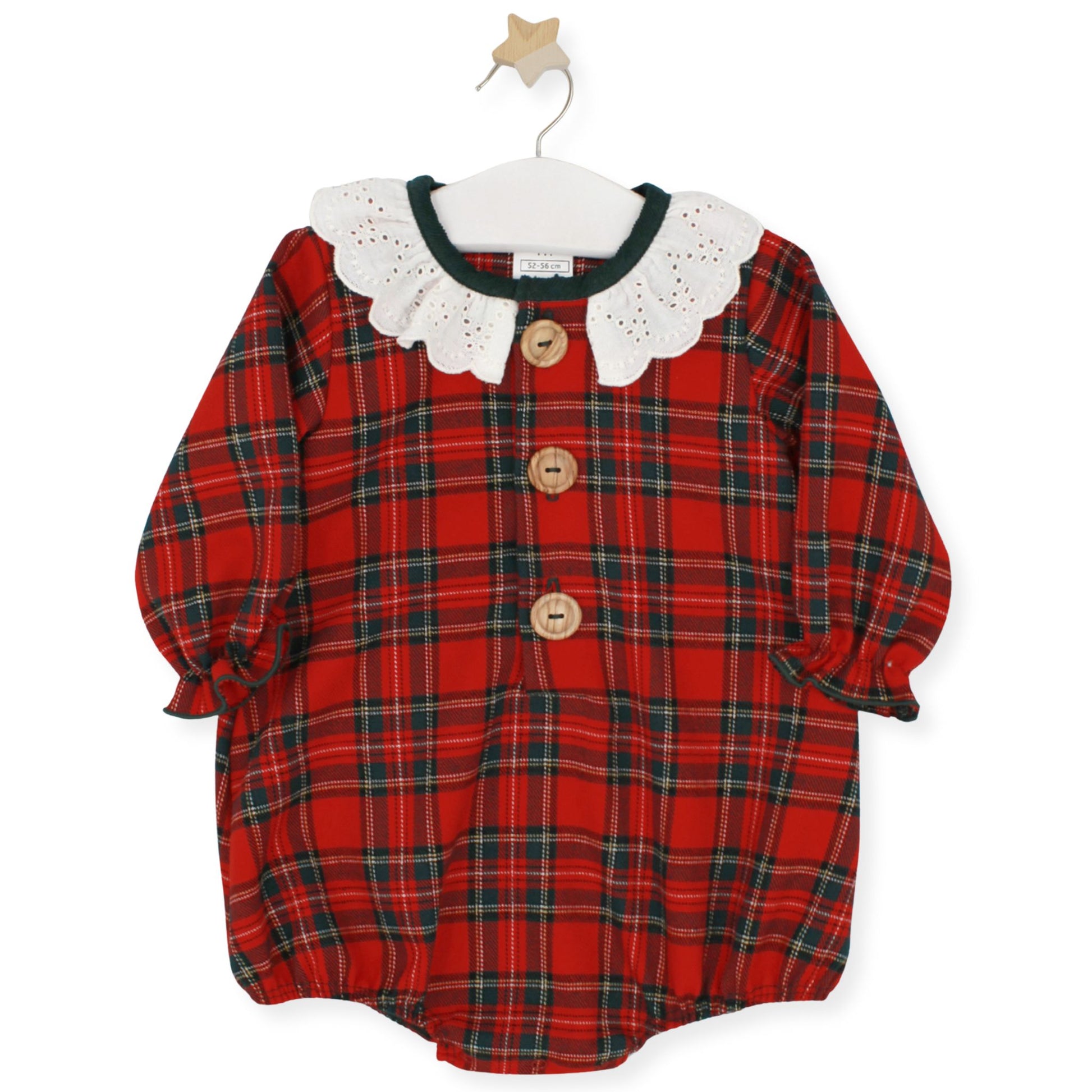 Red tartan baby romper with large white broderie collar and wooden front buttons, by Rapife, displayed on hanger with star hook.
