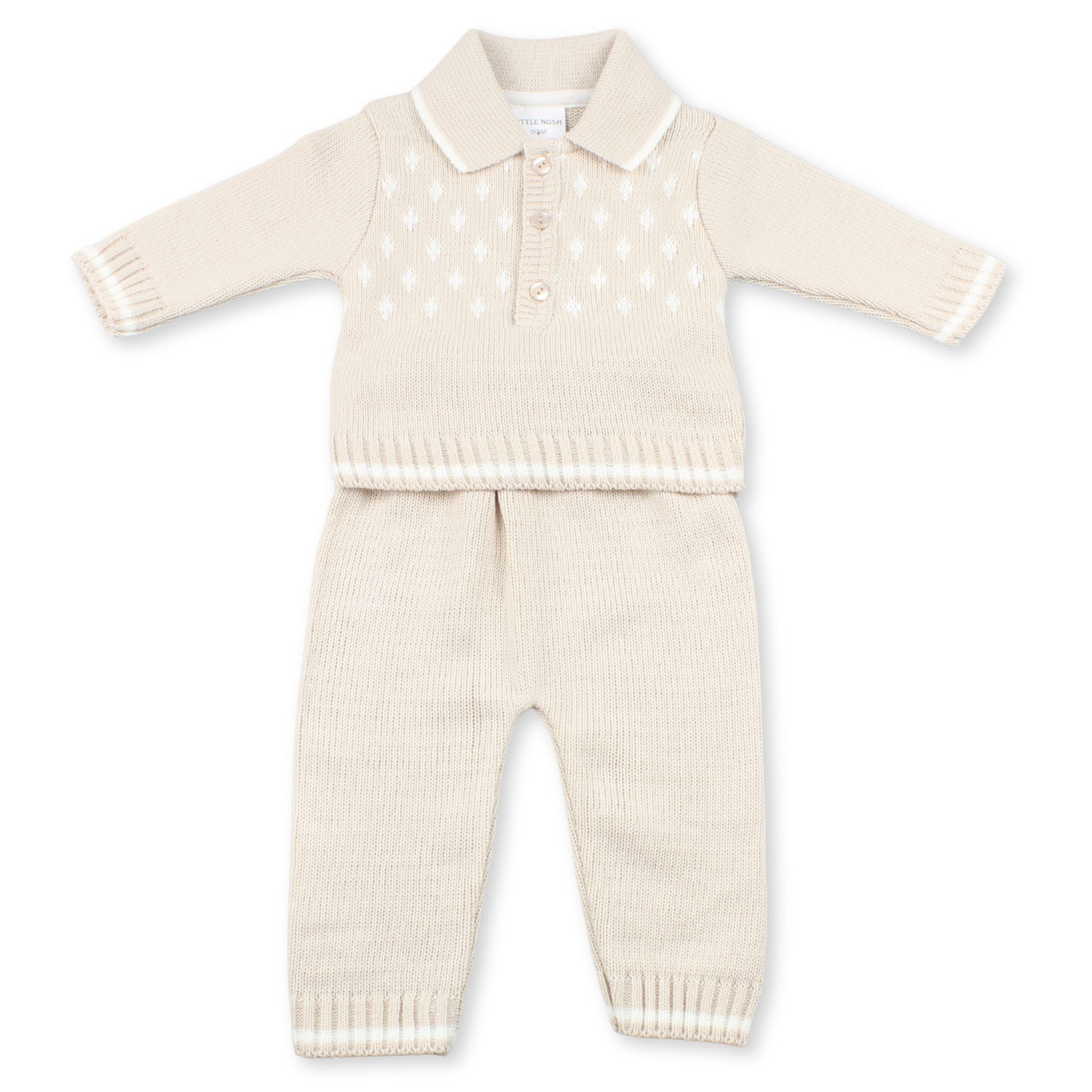 Beige-colored knitted baby outfit with a shirt and pants on a white background
