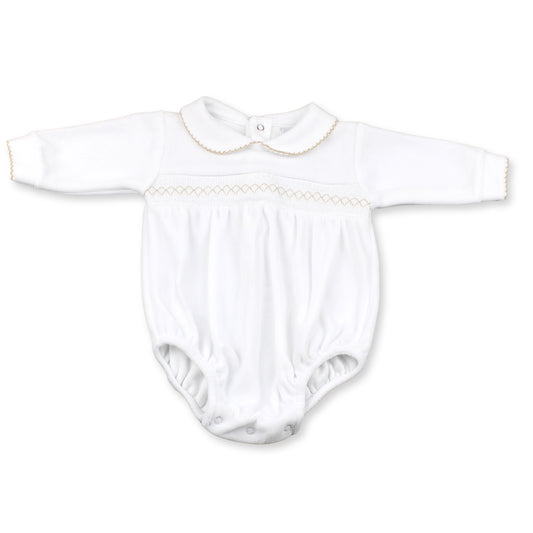 White baby romper with gold trim on a white background
