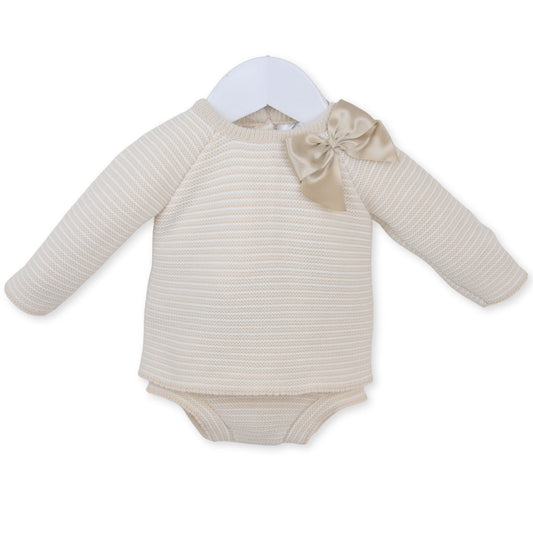 Beige baby bodysuit with a bow on a white background