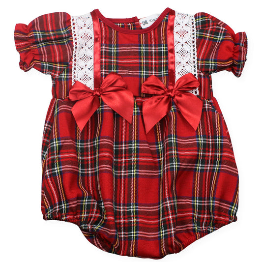 Red plaid baby romper with lace details and bows on a white background