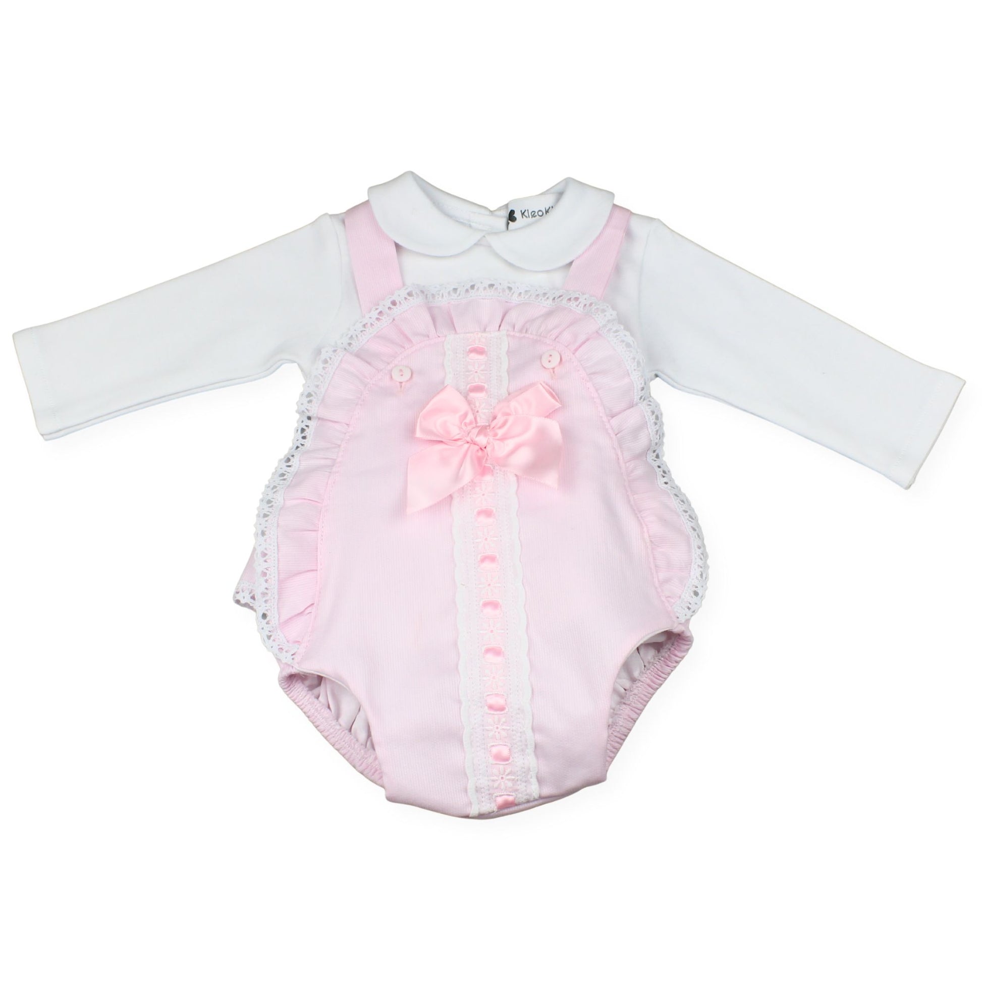 Pink baby romper with ruffles and a white long-sleeve shirt on a white background
