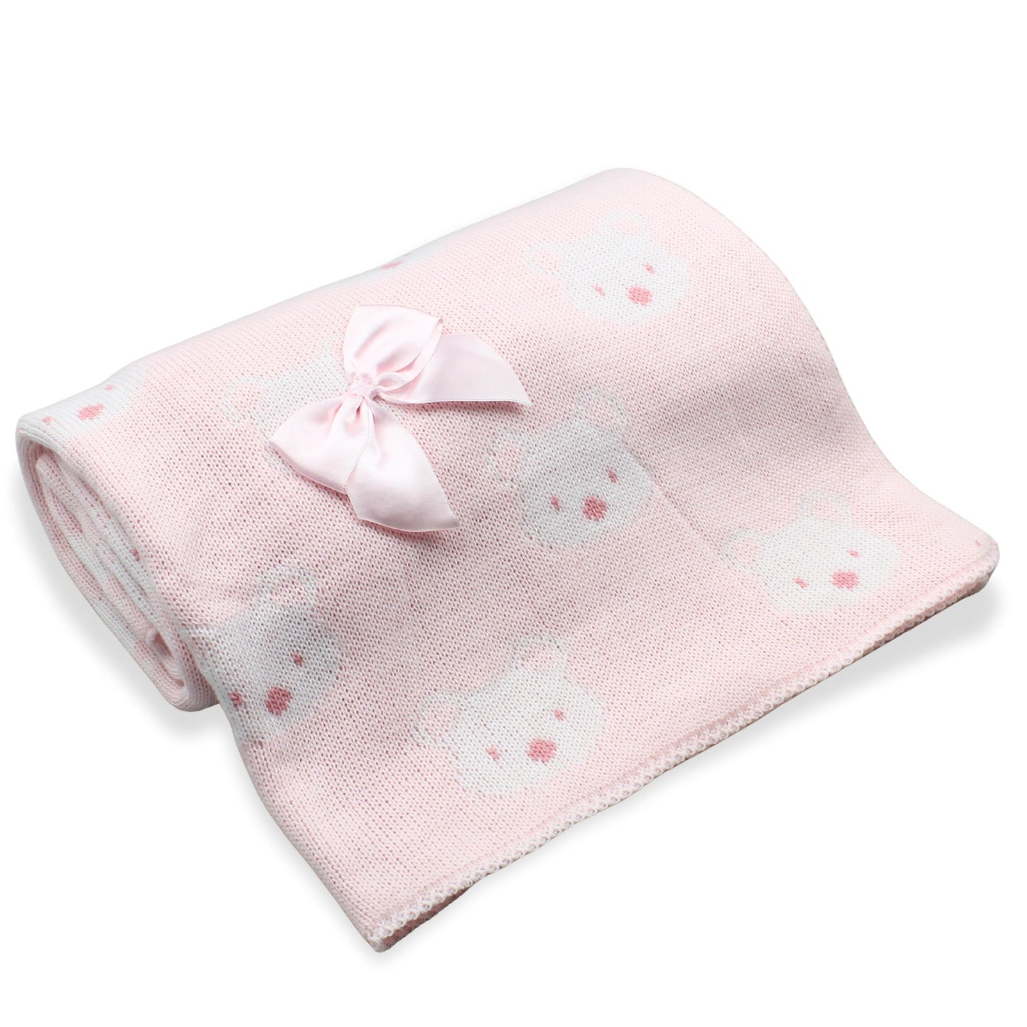 Pink baby blanket with bow and bear patterns on a white background