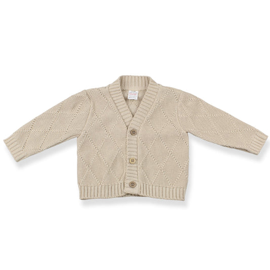 Beige baby cardigan on a white background