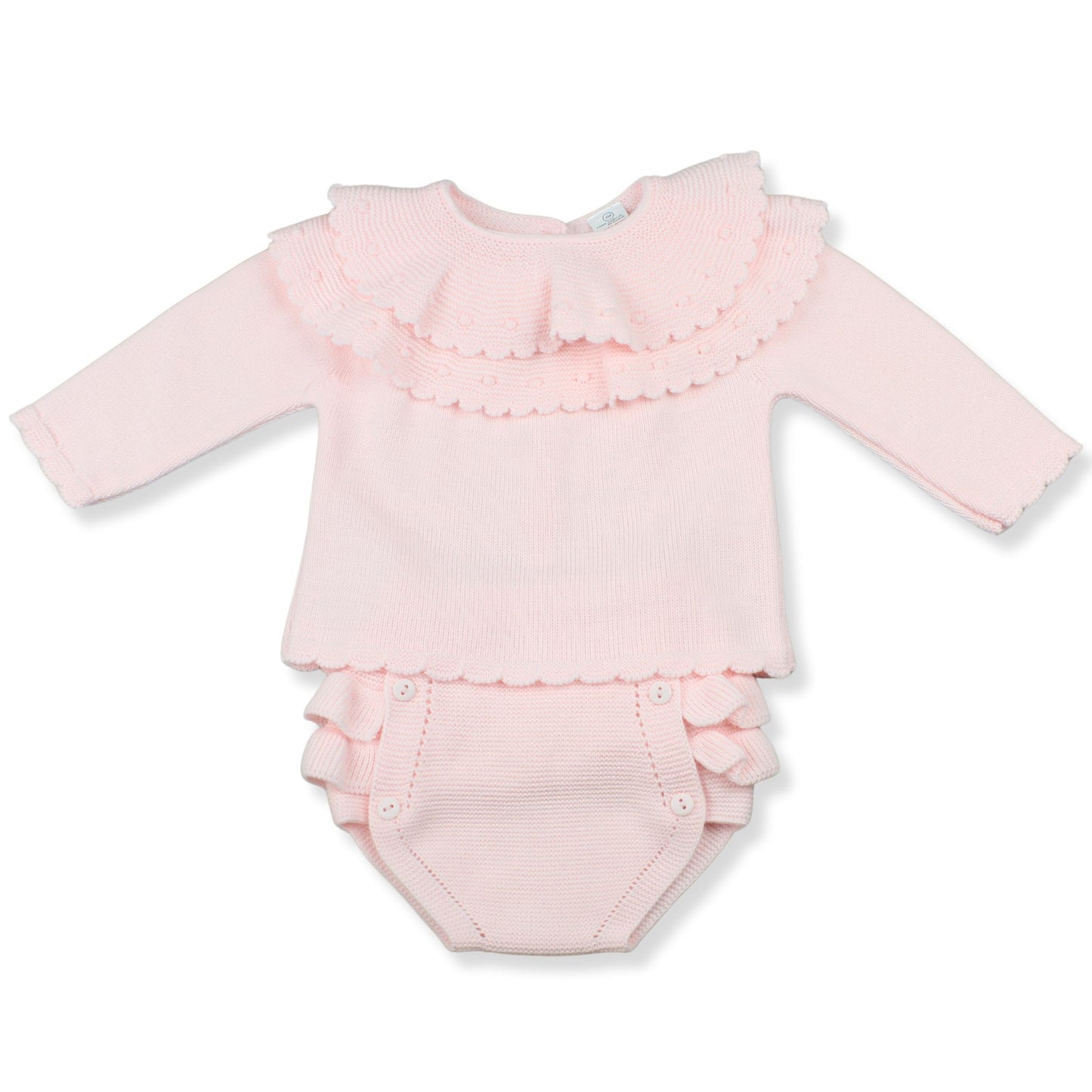Pink baby outfit with ruffled details on a white background