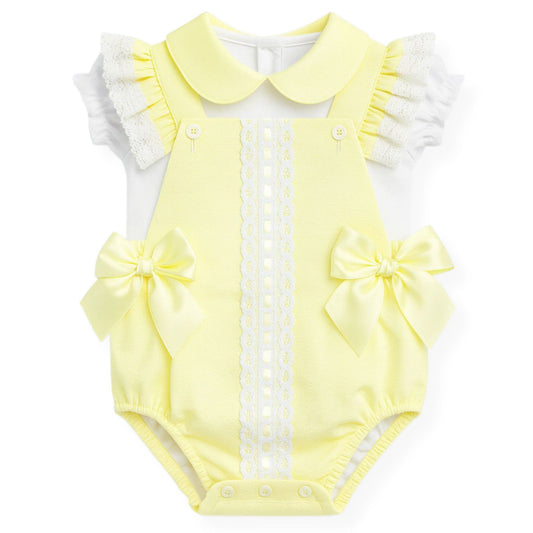 Yellow baby romper with white ruffled sleeves and bow details on a white background