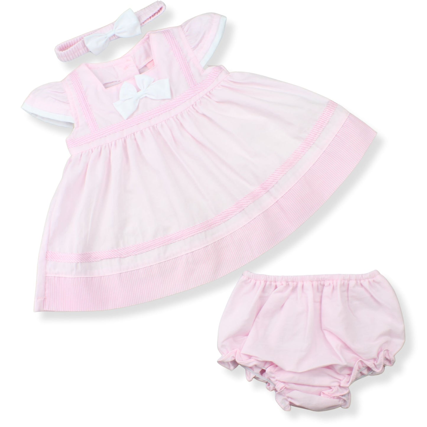Pink baby dress with matching bloomers on a white background