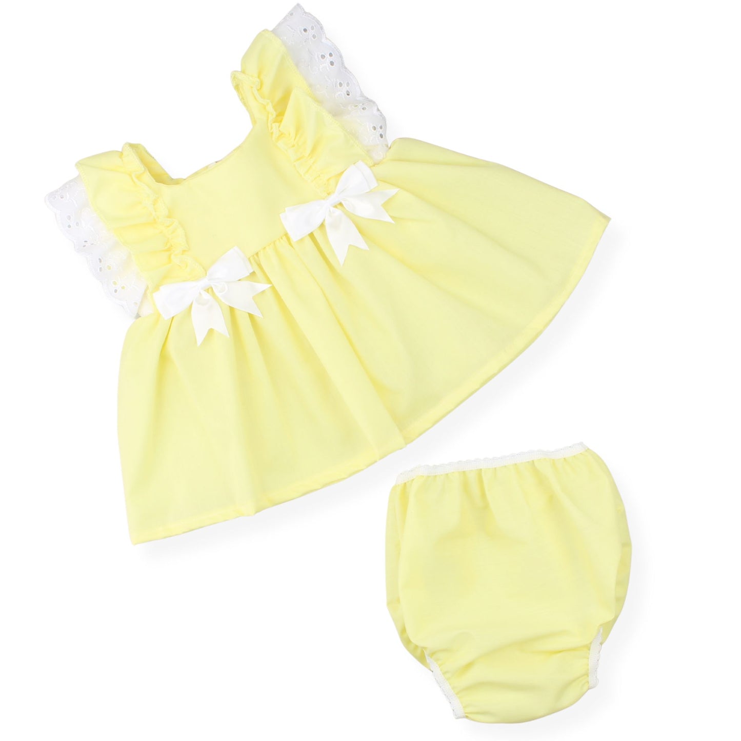 Yellow baby dress with white trim and matching bloomers on a white background